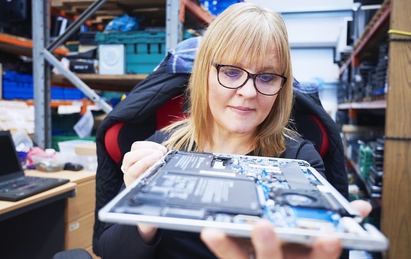 woman repairing computer in recycling centre NatWest and Getty Images urge better representation of female entrepreneurs in media and advertising
