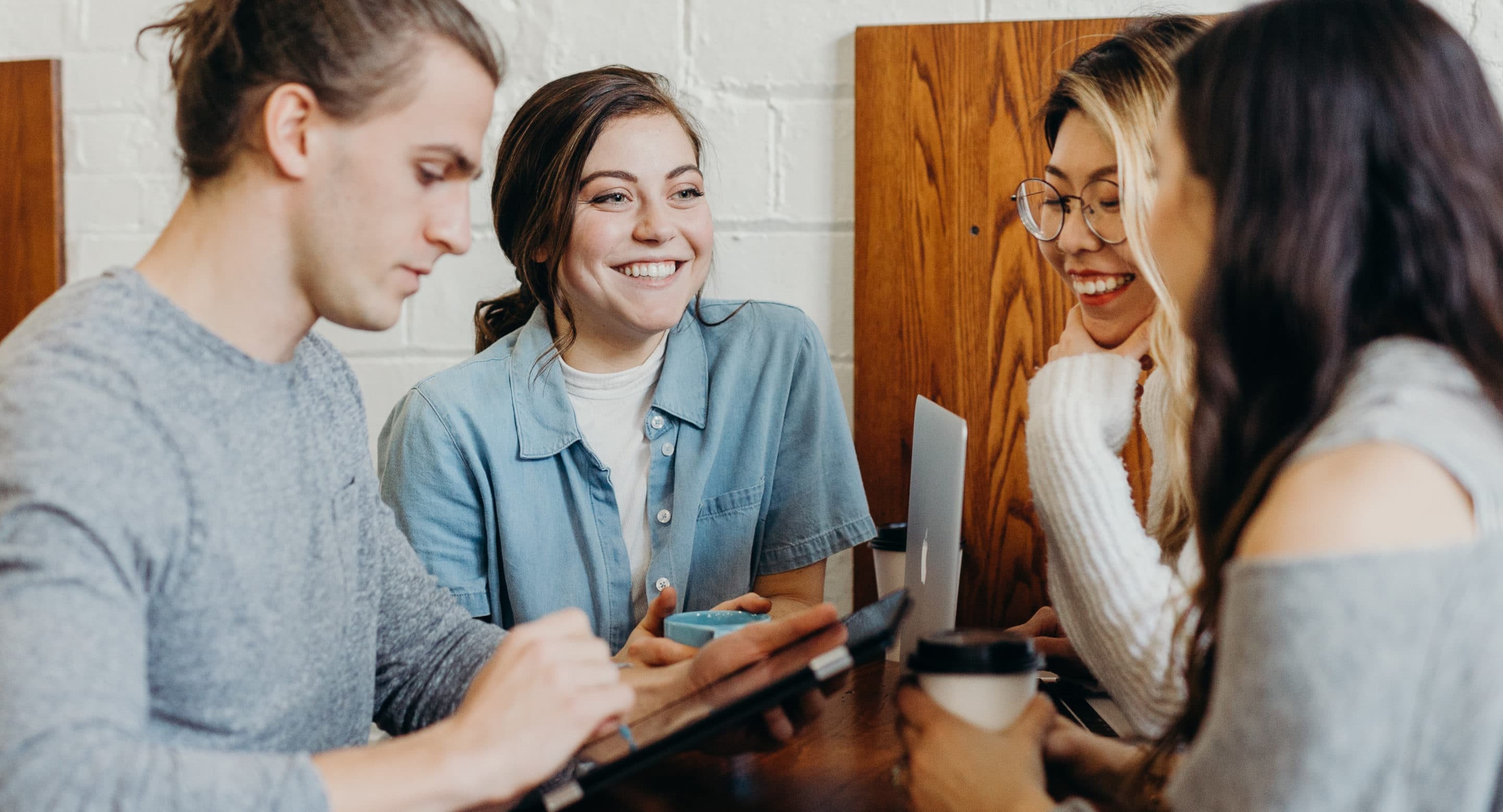 brooke-cagle--uHVRvDr7pg-unsplash-cropped 10 podcasts dominating global listening trends